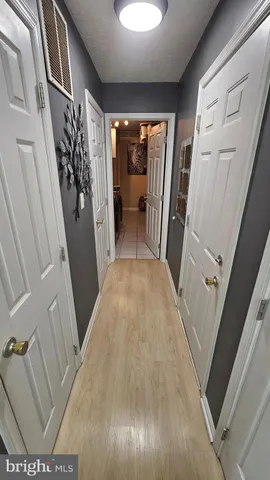 a front view of house with a garden