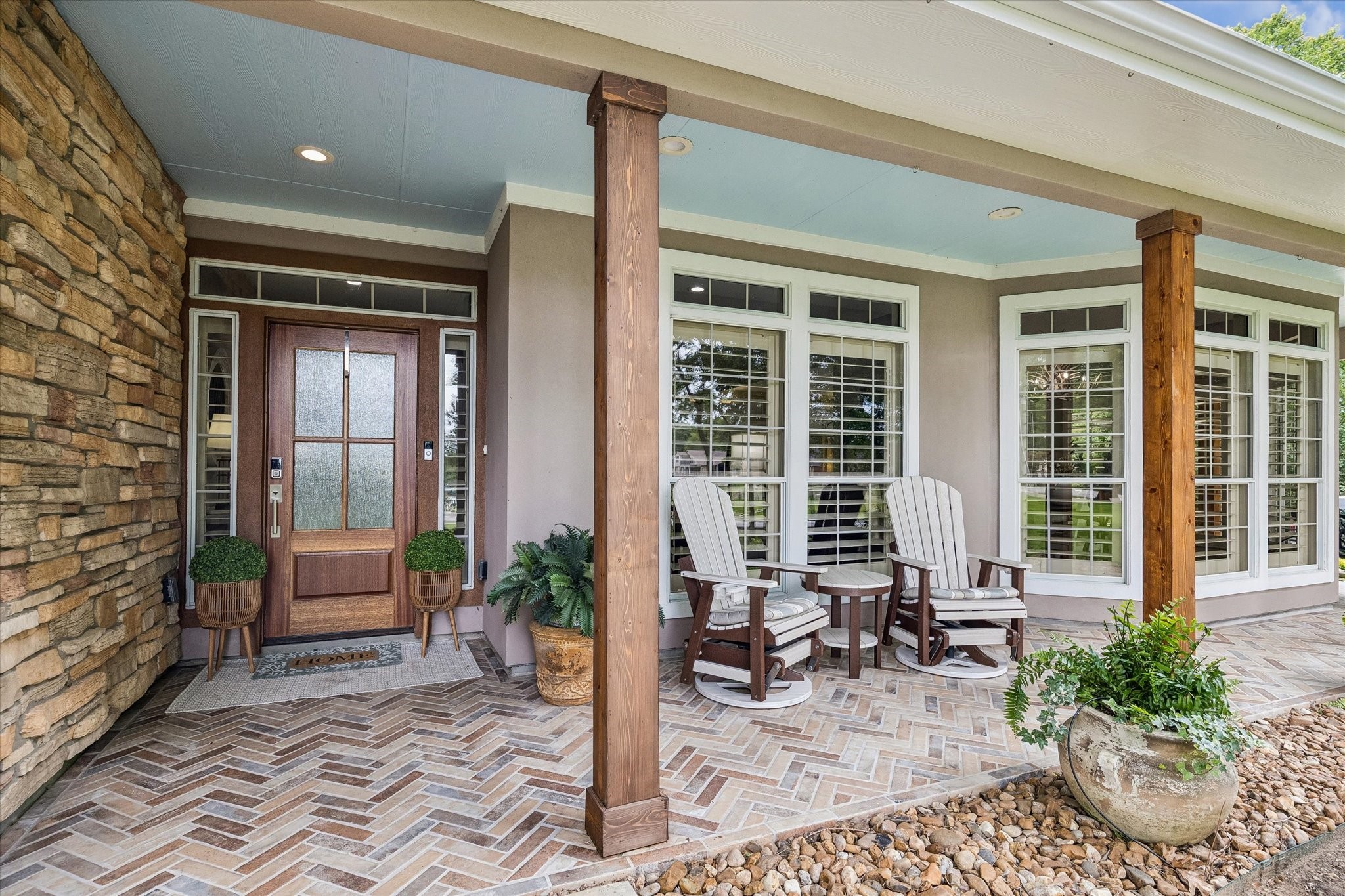 19973 Peel Road Montgomery, TX 77356 - Photo 3 of 31 Enjoy coffee in the morning on your wraparound porch overlooking the lake.