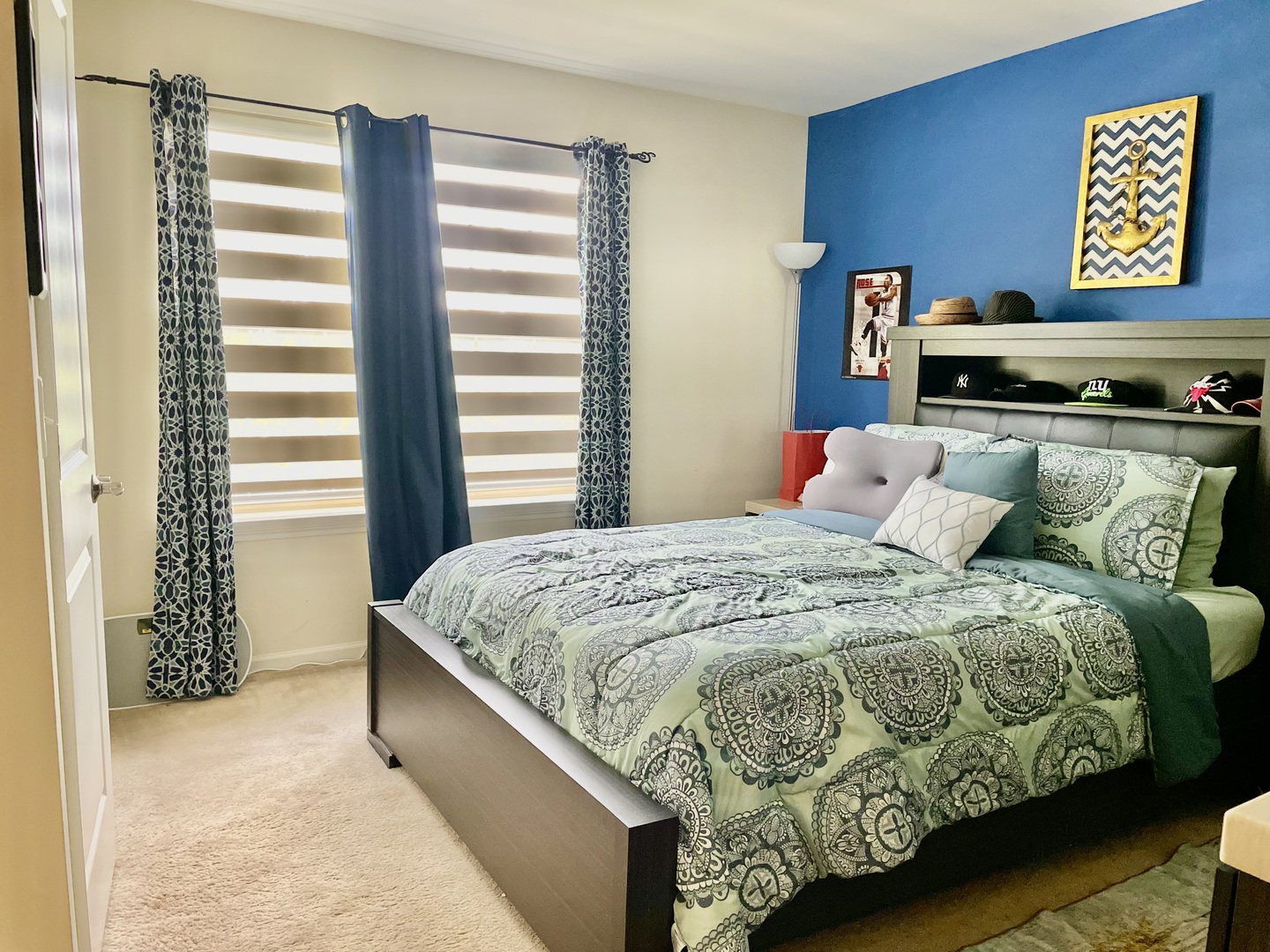 2018 Shermer Road, Unit 2018 Glenview, IL 60026 - Photo 32 of 39 a bedroom with a bed and a window