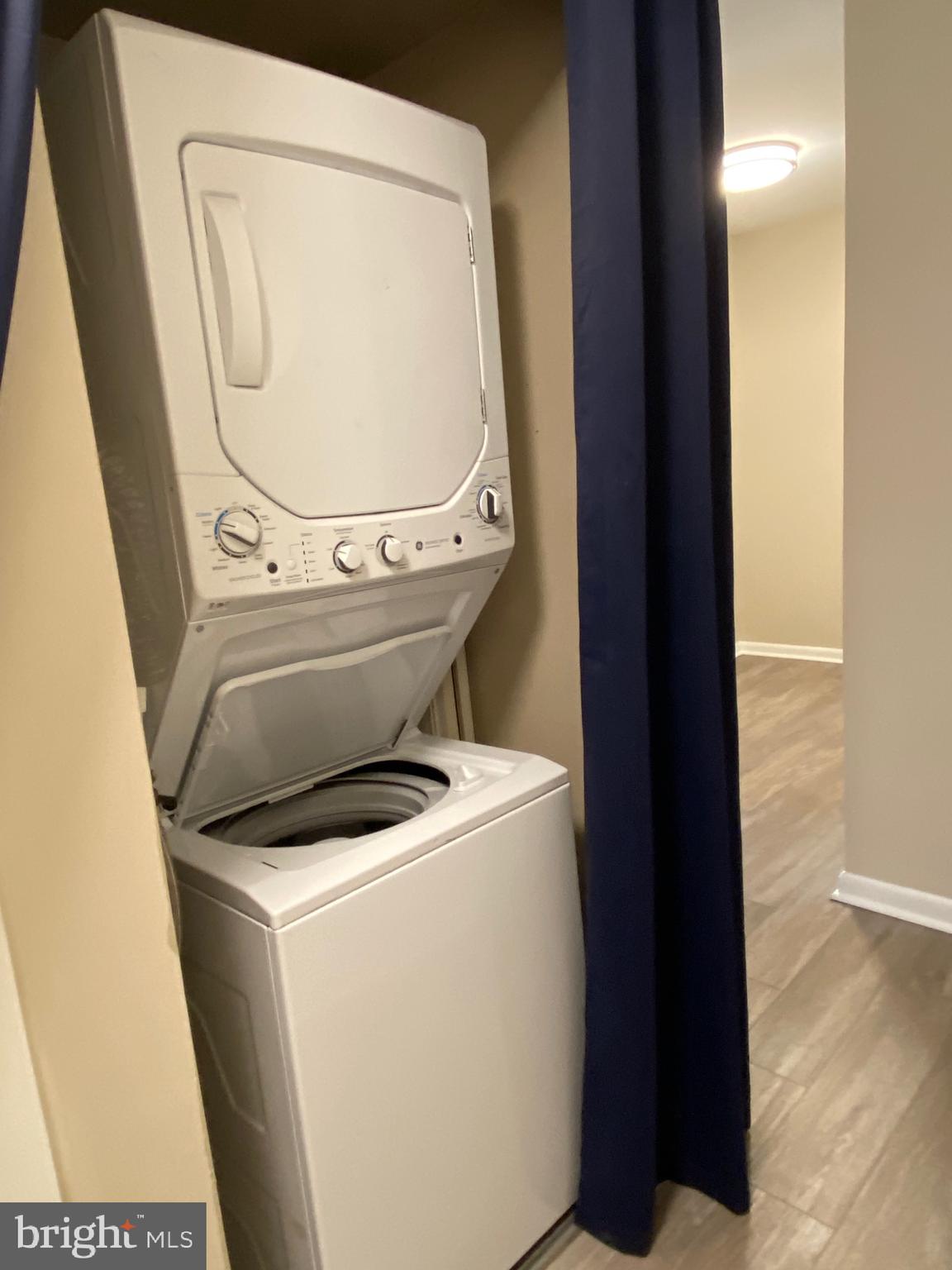 4000 Gypsy Lane, Unit 520 Philadelphia, PA 19129 - Photo 17 of 18 a utility room with dryer and washer