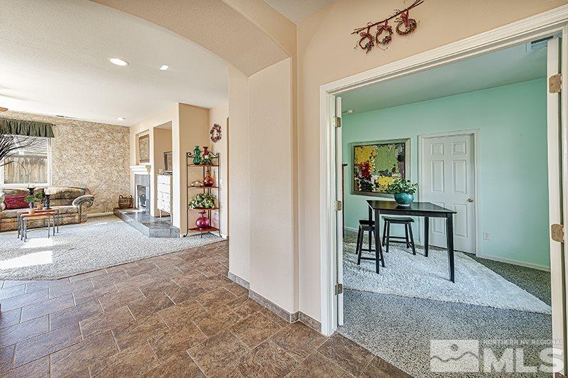 10442 Rockport Lane Reno, NV 89521 - Photo 3 of 17 a view of a livingroom with furniture and windows