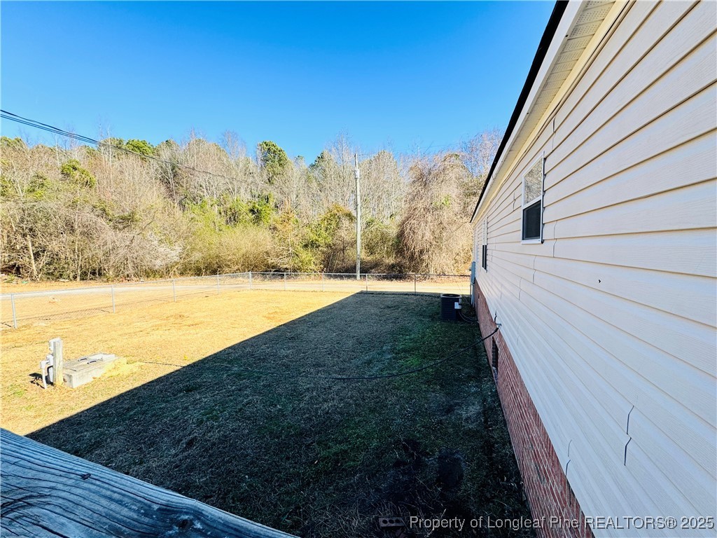 2475 Dunn Road Eastover, NC 28312 - Photo 14 of 17 a view of a yard with an ocean view
