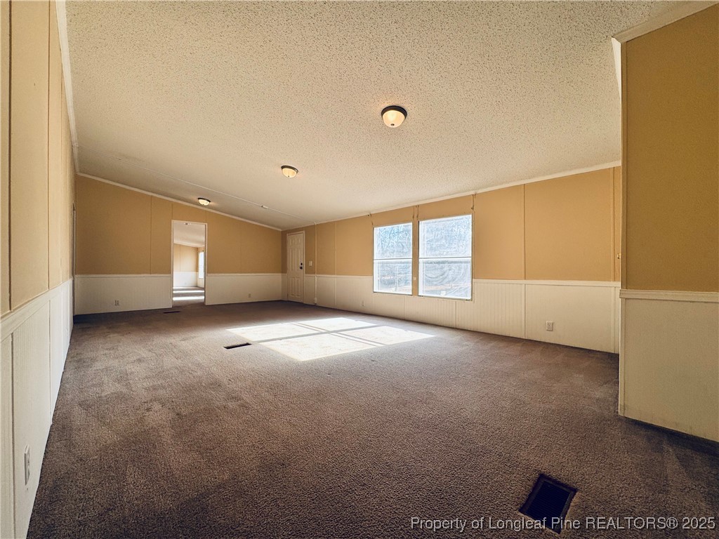 2475 Dunn Road Eastover, NC 28312 - Photo 6 of 17 a view of empty room with a window