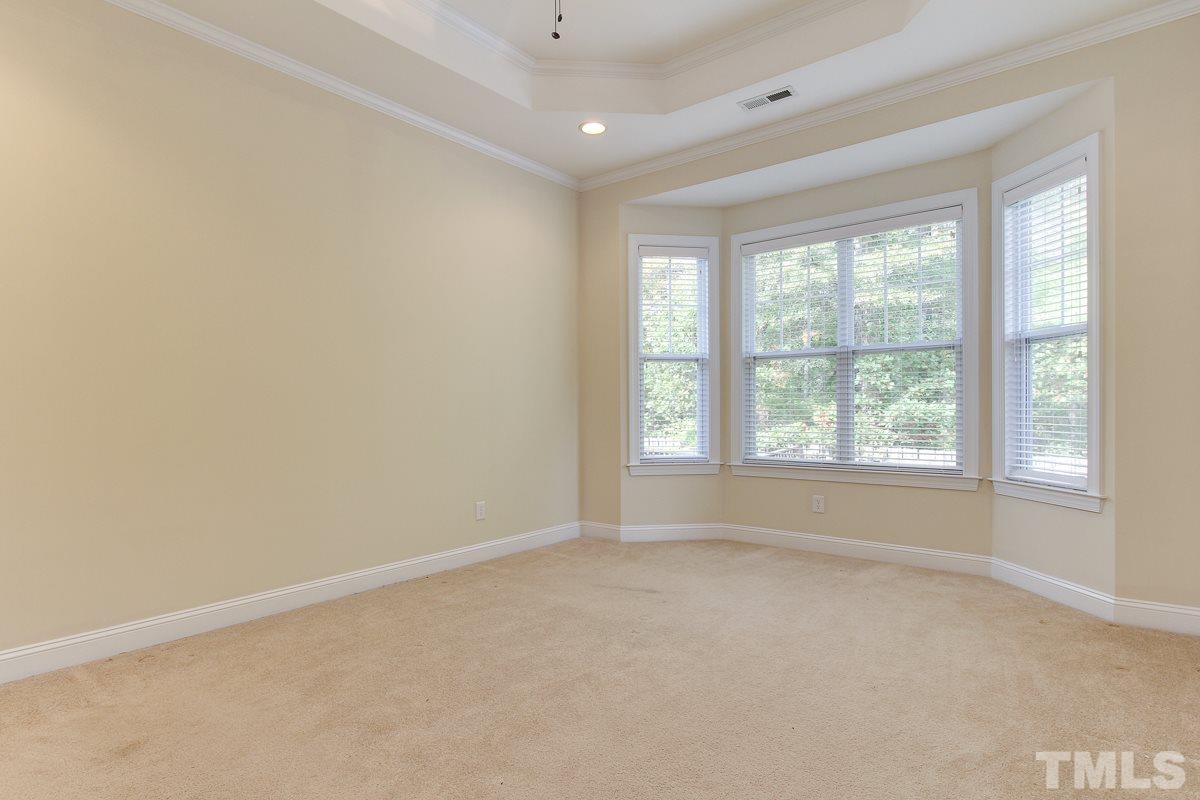 932 Chapanoke Road Raleigh, NC 27603 - Photo 13 of 25 an empty room with windows and closet