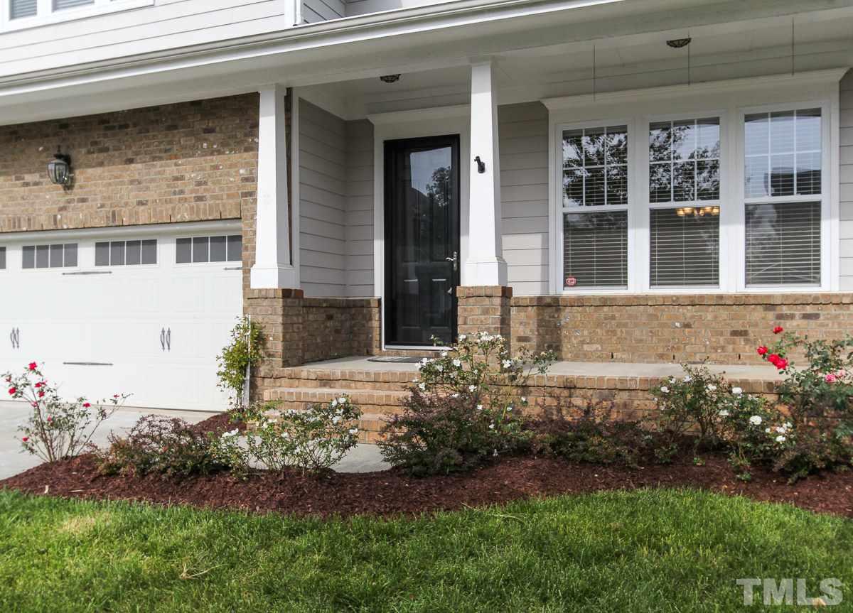 932 Chapanoke Road Raleigh, NC 27603 - Photo 25 of 25 a front view of a house with garden