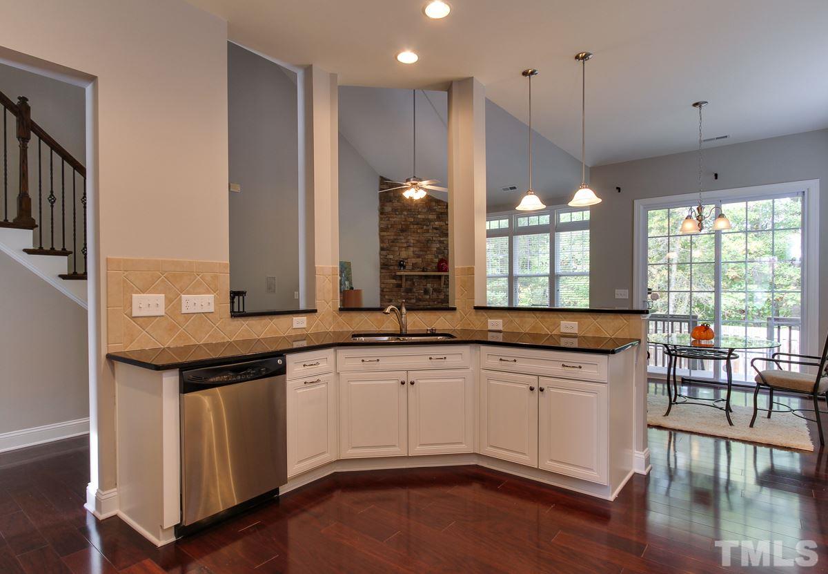 932 Chapanoke Road Raleigh, NC 27603 - Photo 6 of 25 a large kitchen with lots of counter space sink and view living