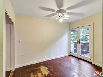 a view of a hallway with windows