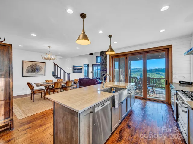 a view of a living room and dining room