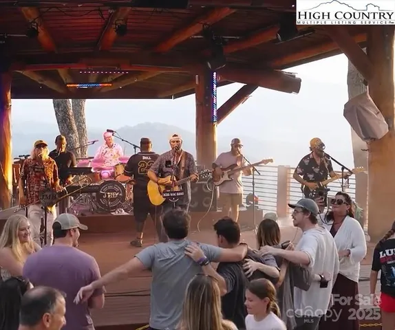 a view of gym equipment and floor to ceiling window