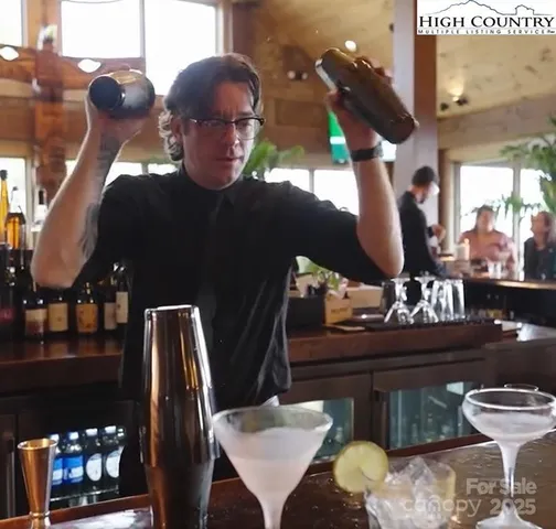 a living room with patio furniture