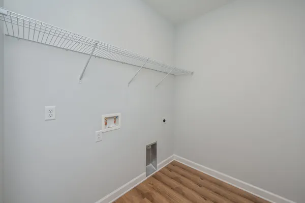 a view of a room with racks on the wall