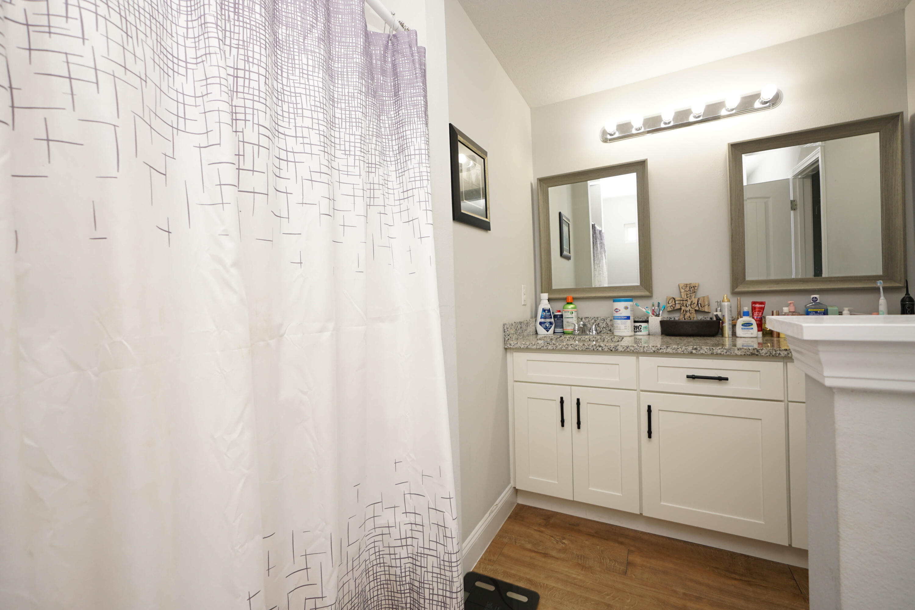 415 Scooter Cove Crestview, FL 32539 - Photo 32 of 45 a bathroom with a double vanity sink mirror and