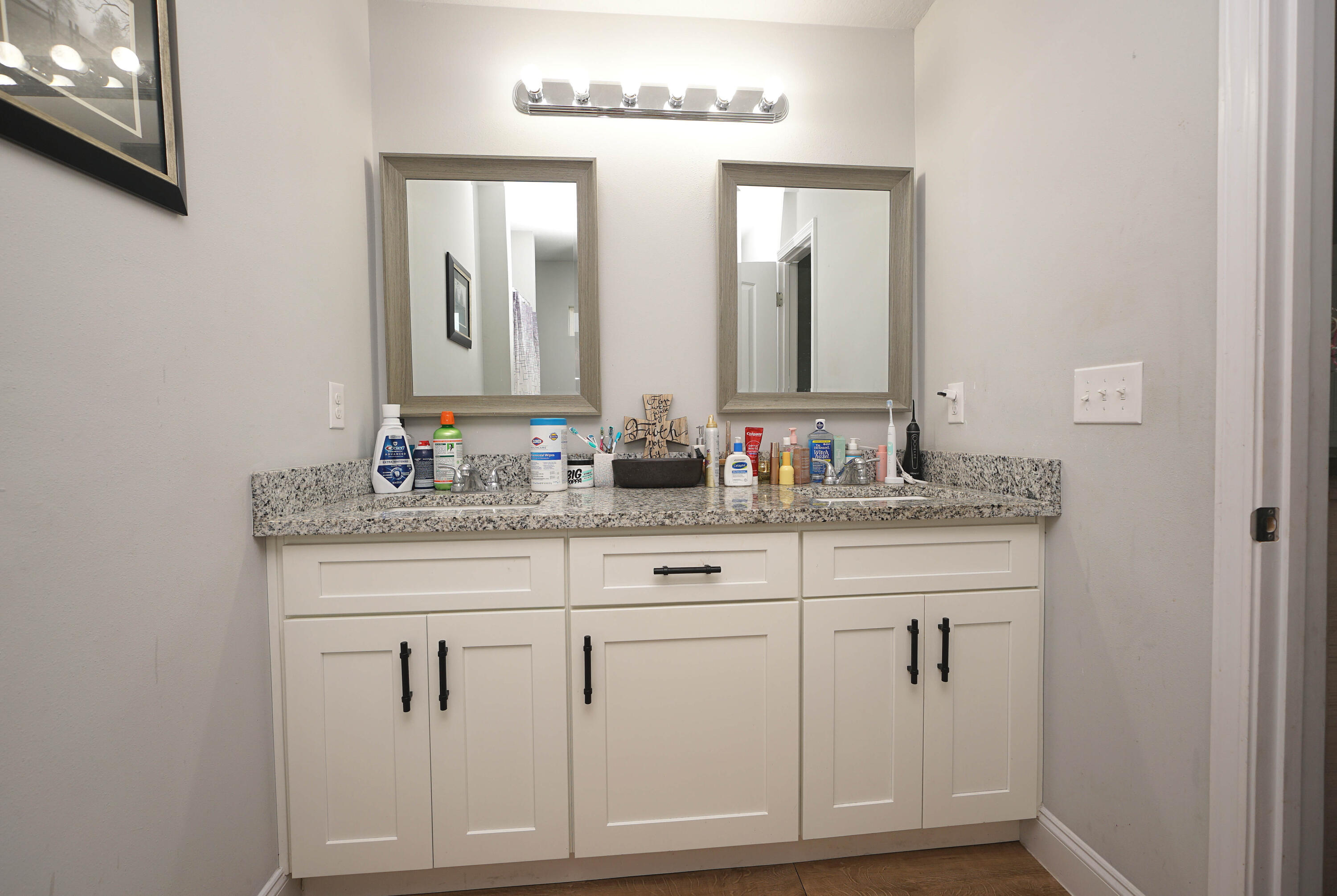415 Scooter Cove Crestview, FL 32539 - Photo 35 of 45 a bathroom with cabinets and sink