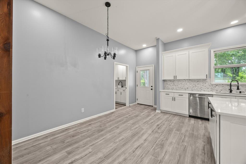 9469 Lakeland Loop Quinlan, TX 75474 - Photo 14 of 31 a view of a kitchen with electric appliances