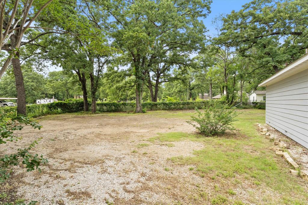 9469 Lakeland Loop Quinlan, TX 75474 - Photo 4 of 31 a view of backyard with outdoor space