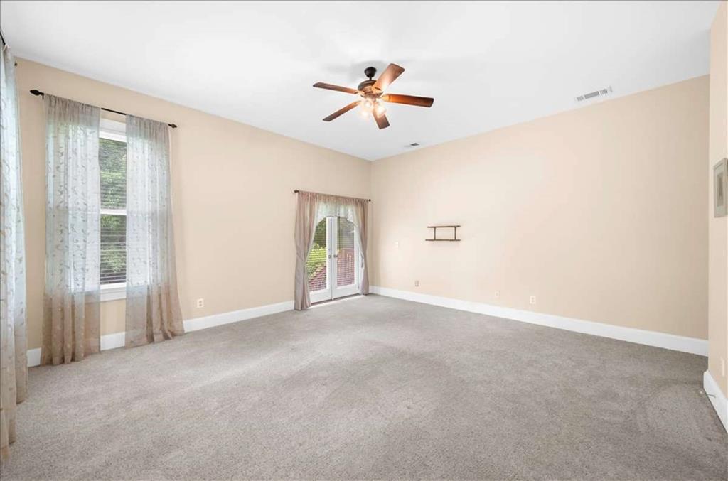 106 Westmore Road Southwest Rome, GA 30165 - Photo 40 of 56 a view of a livingroom with a ceiling fan and window