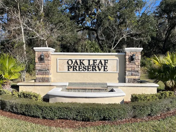 a front view of a house with a garage