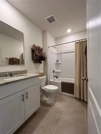 a bedroom with a bed and a closet