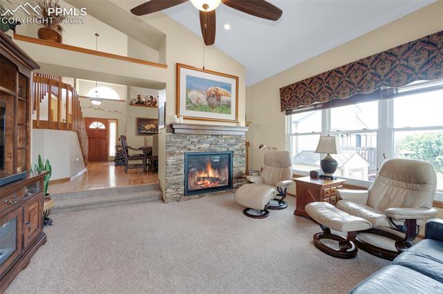 5220 Silo Ridge Colorado Springs, CO 80917 - Photo 19 of 36 Cozy fireplace in living room