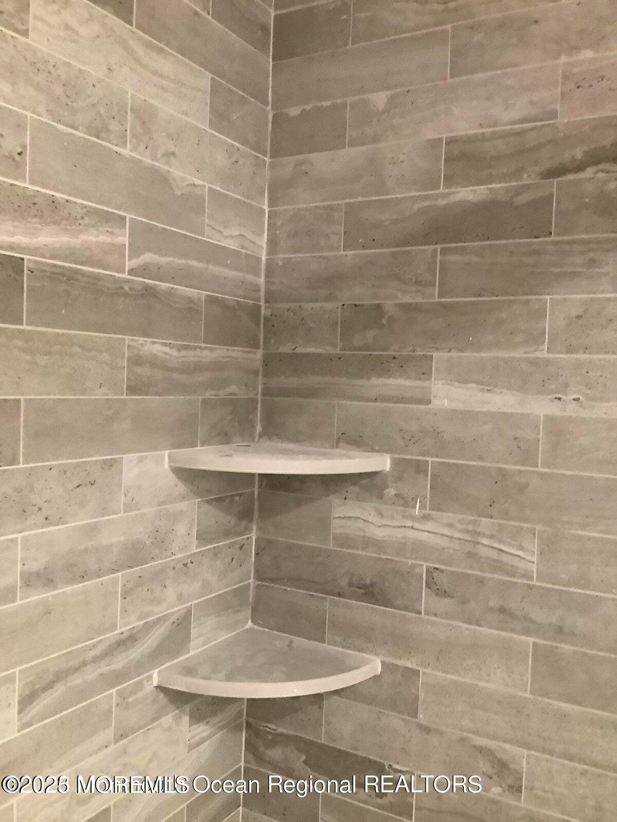 506 Harding Road, Unit 6 Freehold, NJ 07728 - Photo 27 of 31 a bathroom with a shower