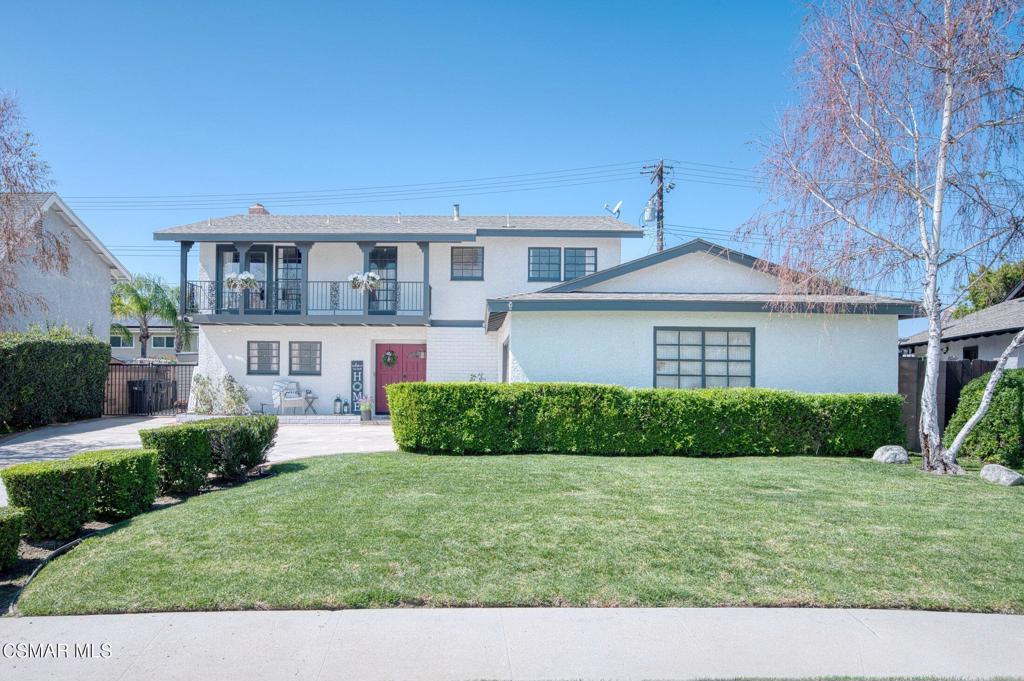 1837 Marcella Street Simi Valley, CA 93065 - Photo 2 of 66 a front view of a house with a yard