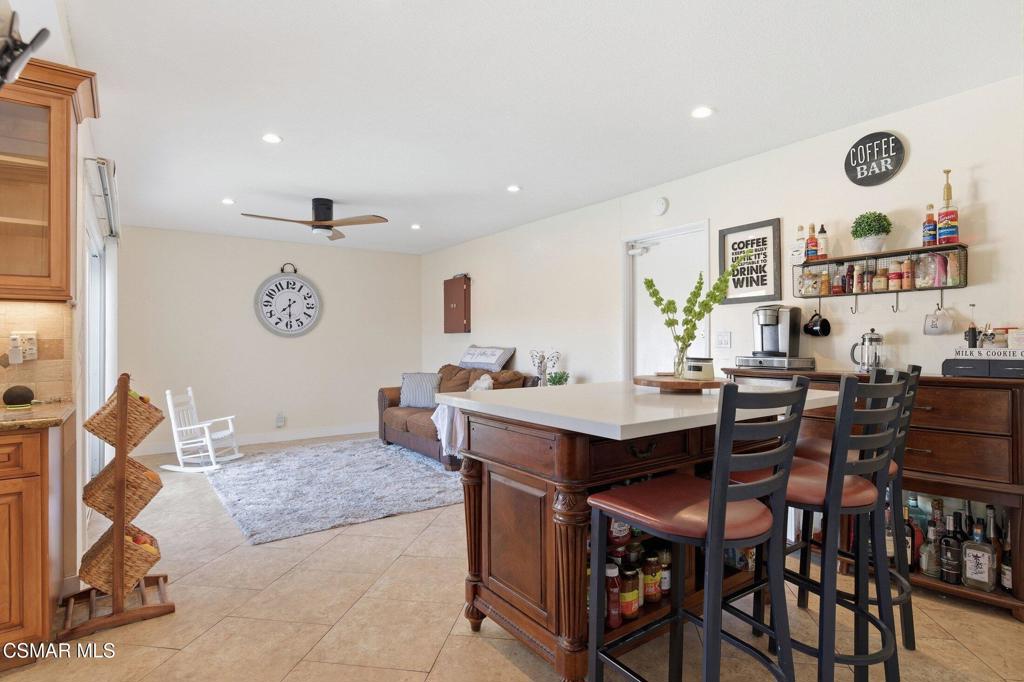 1837 Marcella Street Simi Valley, CA 93065 - Photo 23 of 66 a view of a room that has a table and chairs in it