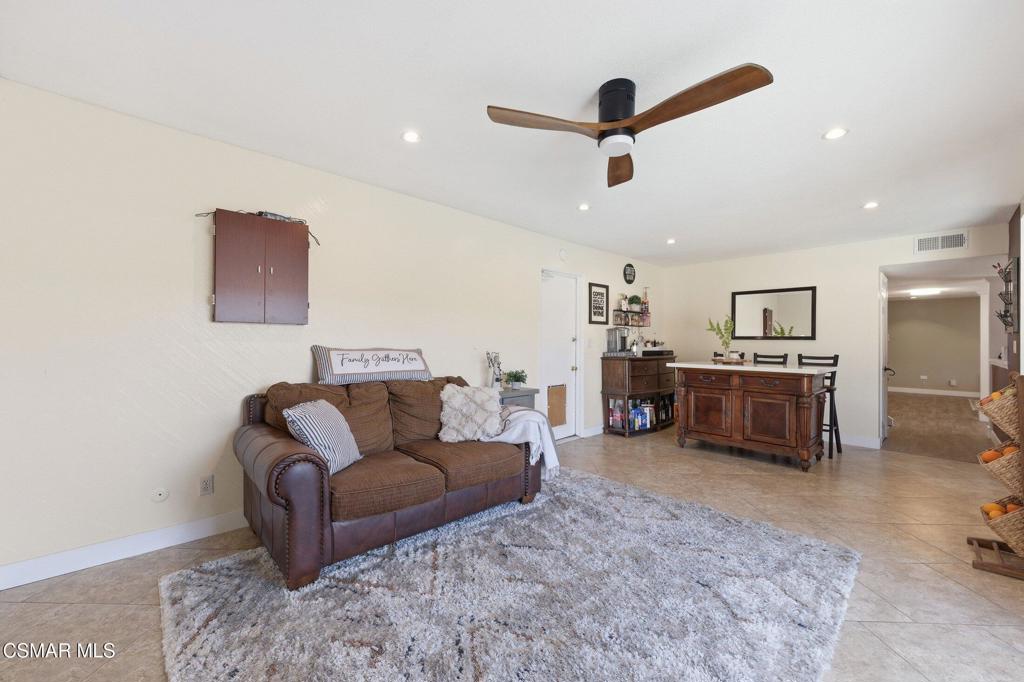 1837 Marcella Street Simi Valley, CA 93065 - Photo 25 of 66 a living room with furniture and a ceiling fan