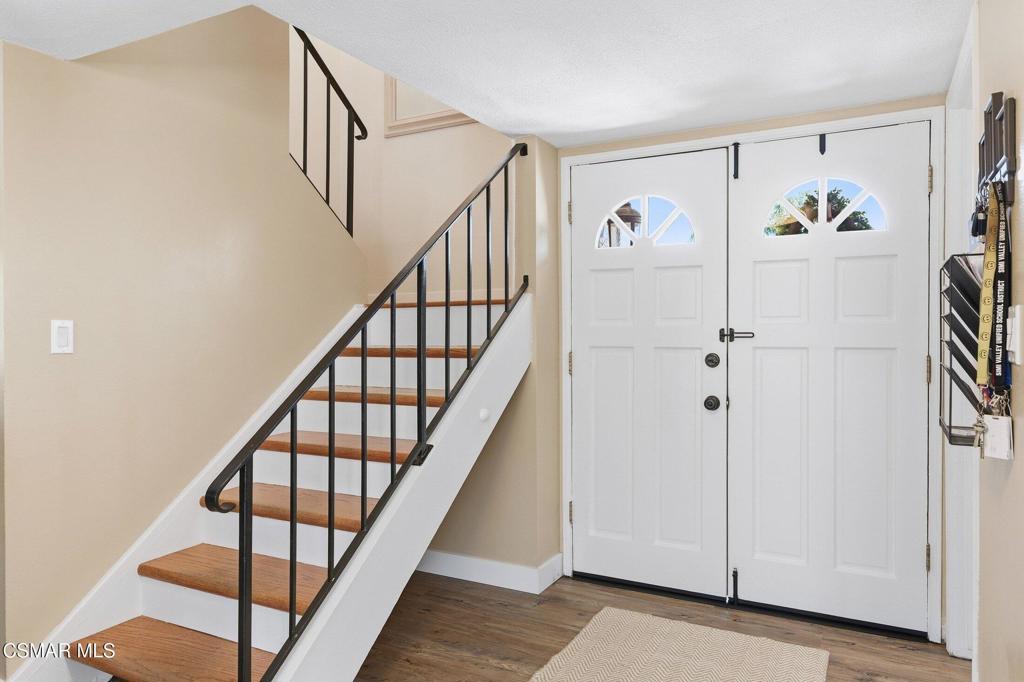 1837 Marcella Street Simi Valley, CA 93065 - Photo 31 of 66 a view of entryway with stairs and wooden floor
