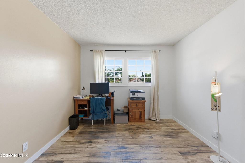 1837 Marcella Street Simi Valley, CA 93065 - Photo 35 of 66 a workspace with wooden floor