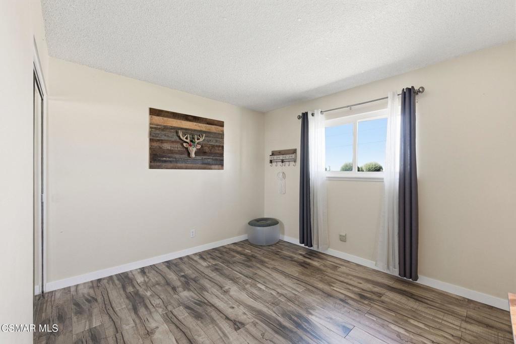 1837 Marcella Street Simi Valley, CA 93065 - Photo 37 of 66 a view of a room with wooden floor and bathroom