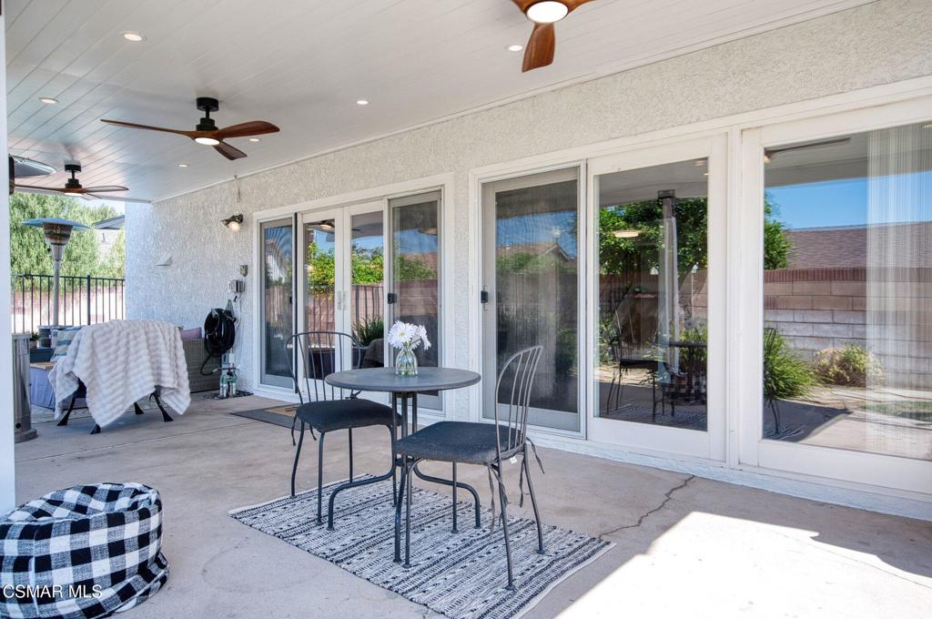 1837 Marcella Street Simi Valley, CA 93065 - Photo 54 of 66 a living room with furniture and a floor to ceiling window
