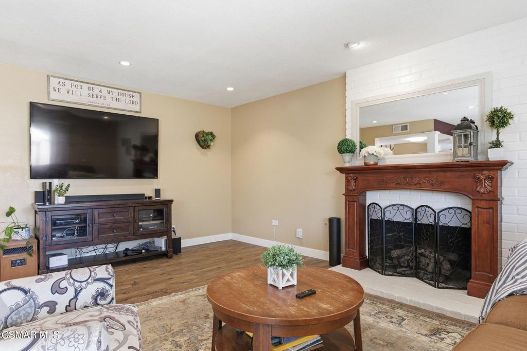 1837 Marcella Street Simi Valley, CA 93065 - Photo 6 of 66 a living room with furniture and a fireplace