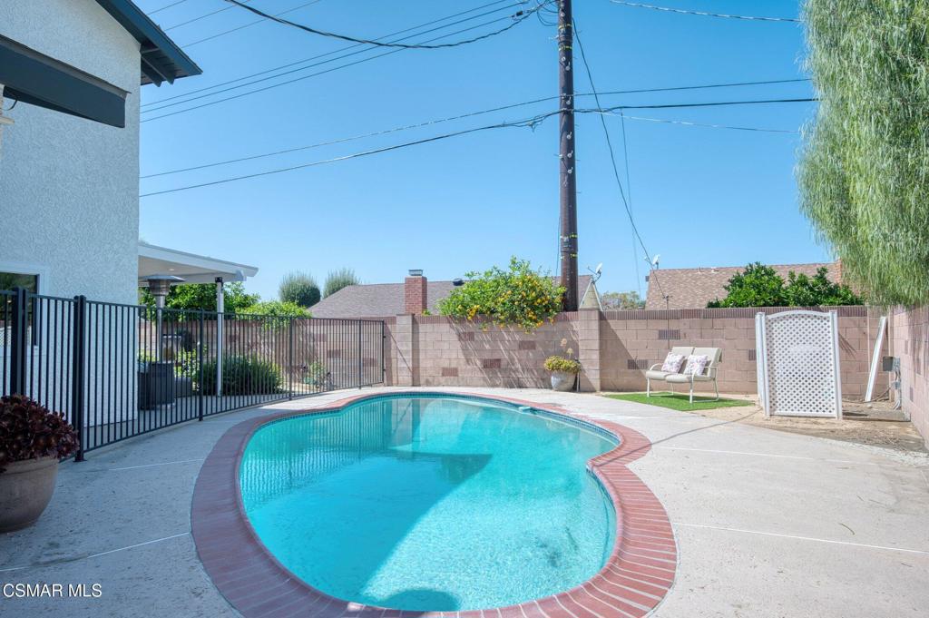 1837 Marcella Street Simi Valley, CA 93065 - Photo 64 of 66 a view of a swimming pool with a patio