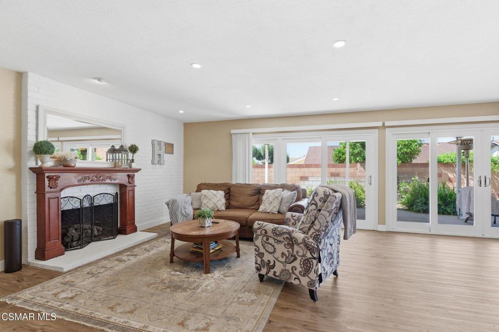 1837 Marcella Street Simi Valley, CA 93065 - Photo 7 of 66 a living room with furniture a window and a fireplace
