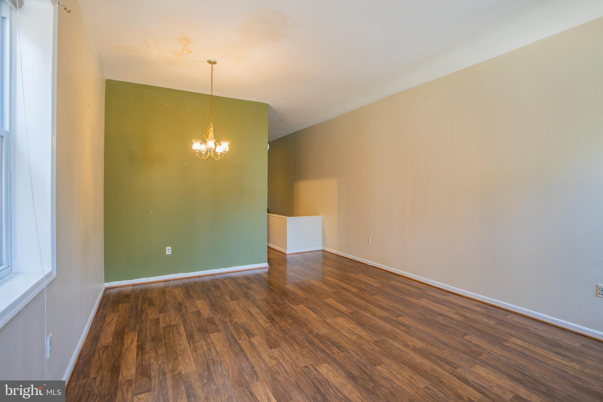 909 R Street Northwest, Unit B Washington, DC 20001 - Photo 5 of 17 a view of empty room with wooden floor