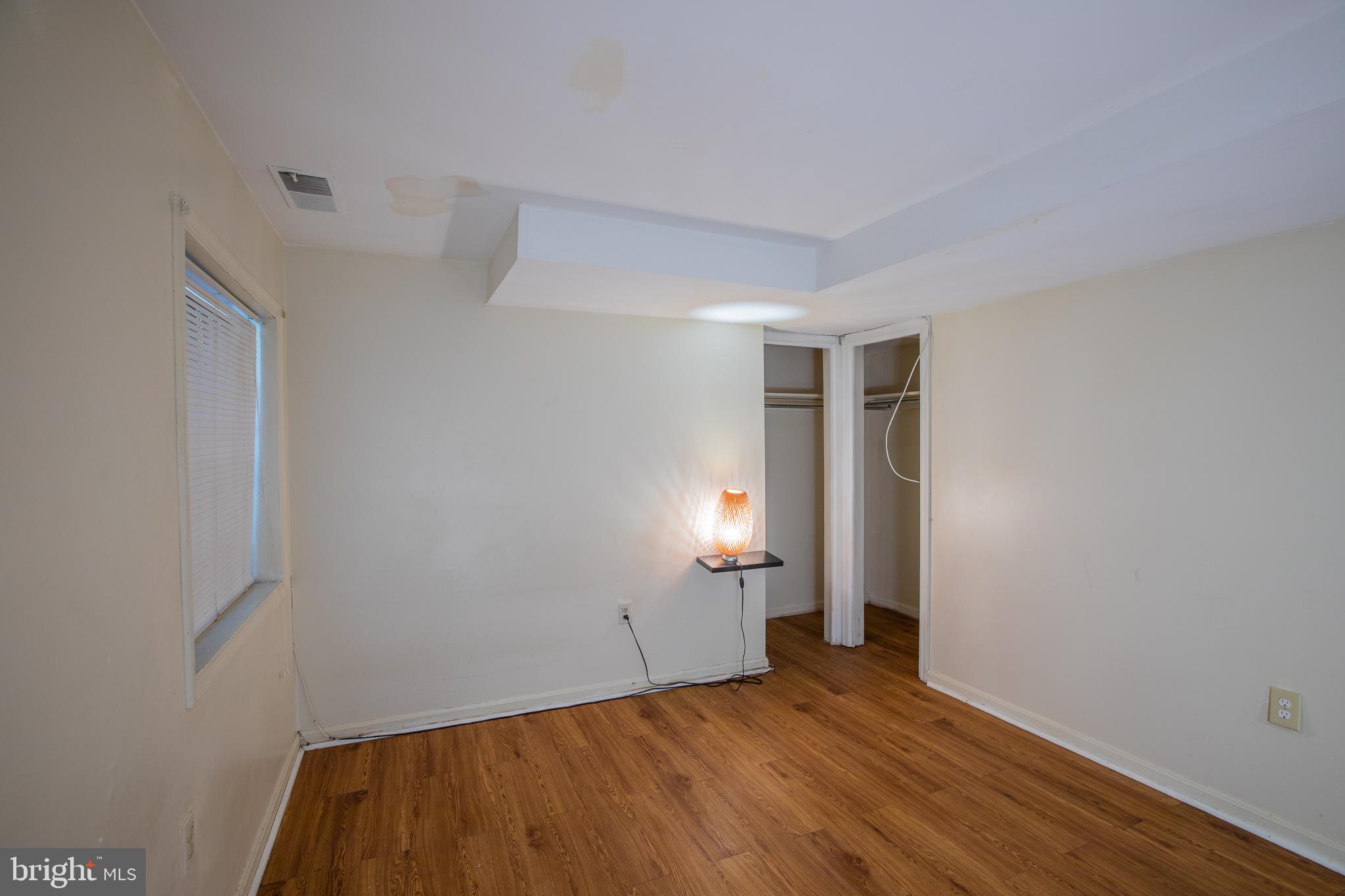 909 R Street Northwest, Unit B Washington, DC 20001 - Photo 9 of 17 a view of empty room with wooden floor