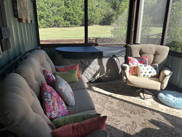 a front view of house with yard and outdoor seating