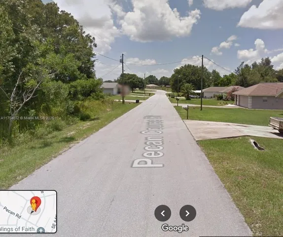 a view of swimming pool with a yard