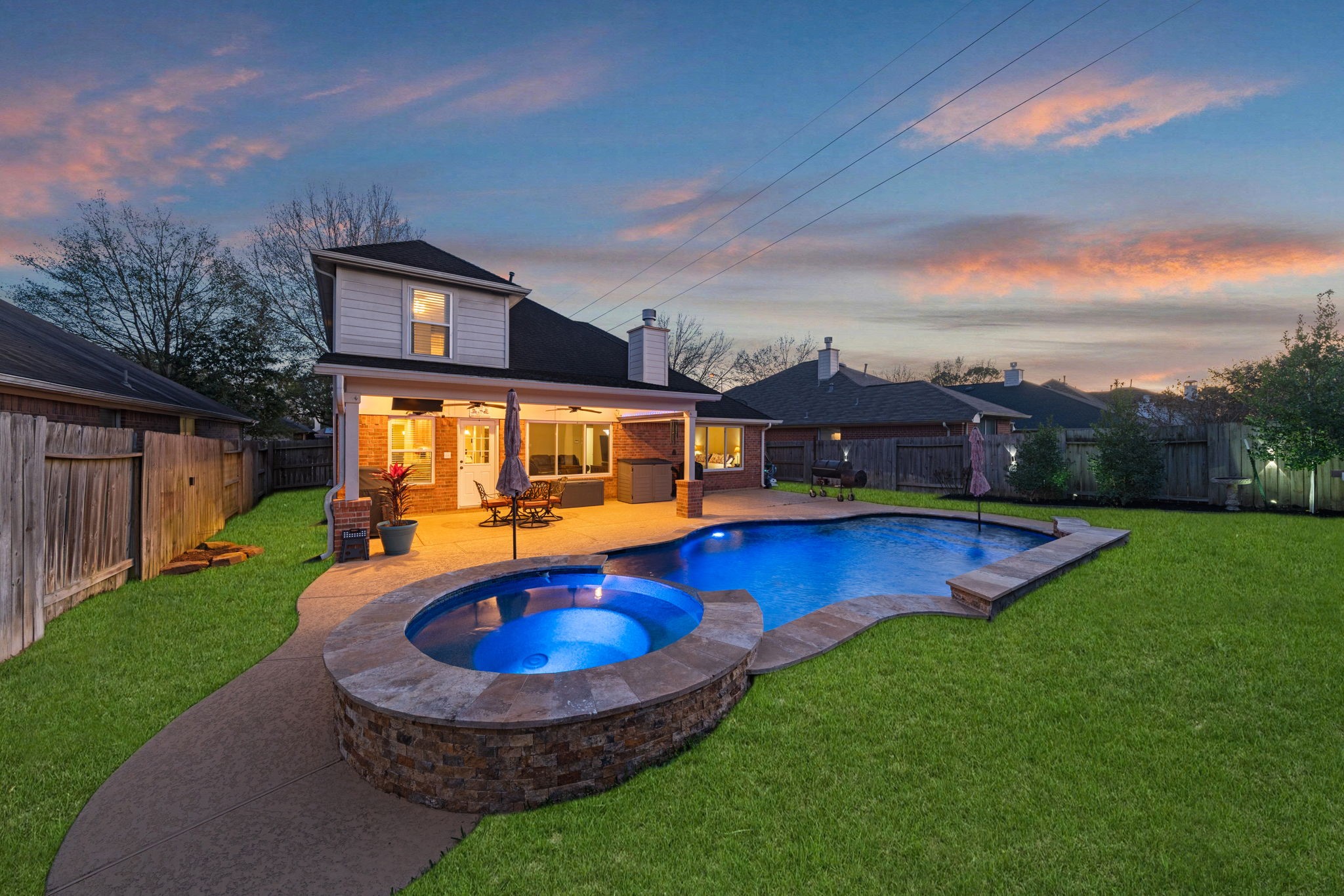 15319 Court Green Trail Cypress, TX 77433 - Photo 2 of 44 a view of a house with swimming pool yard and porch