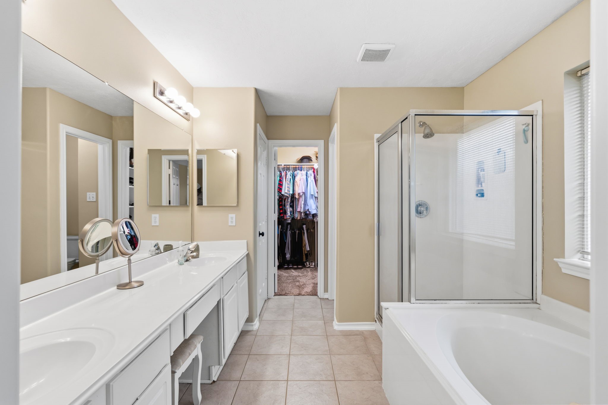 15319 Court Green Trail Cypress, TX 77433 - Photo 22 of 44 The primary bath offers ample storage, a linen closet and a large walk-in closet