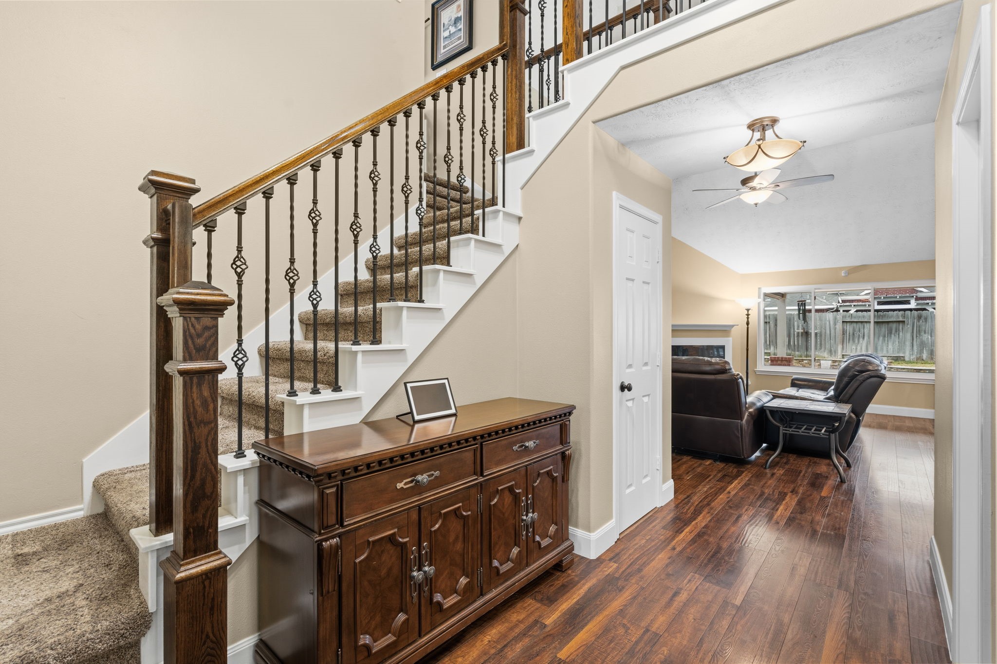 15319 Court Green Trail Cypress, TX 77433 - Photo 25 of 44 Stairway featuring a custom banister and balusters that enhance the open feel
