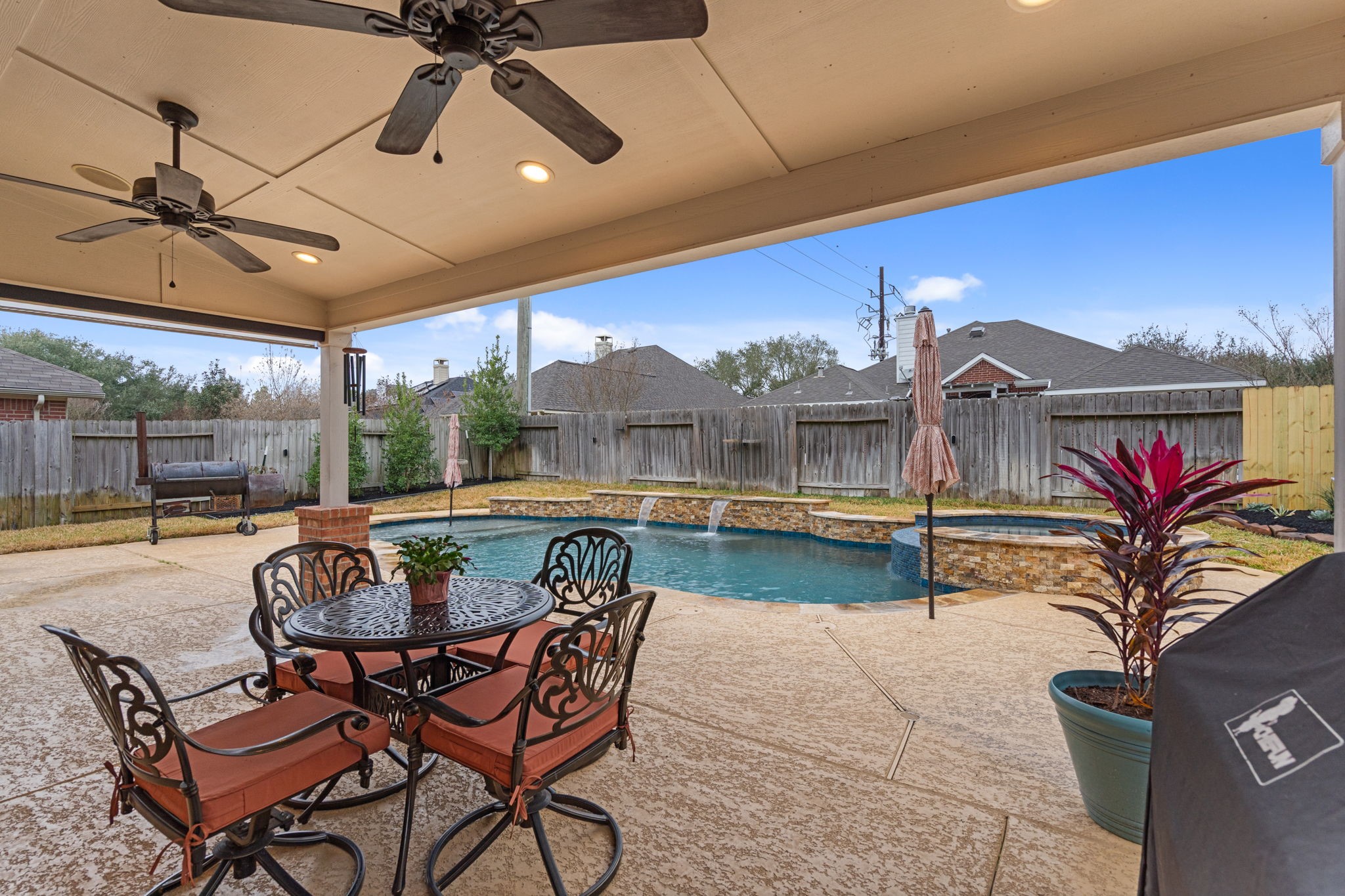 15319 Court Green Trail Cypress, TX 77433 - Photo 4 of 44 Spacious covered patio plus an extended outdoor entertaining deck