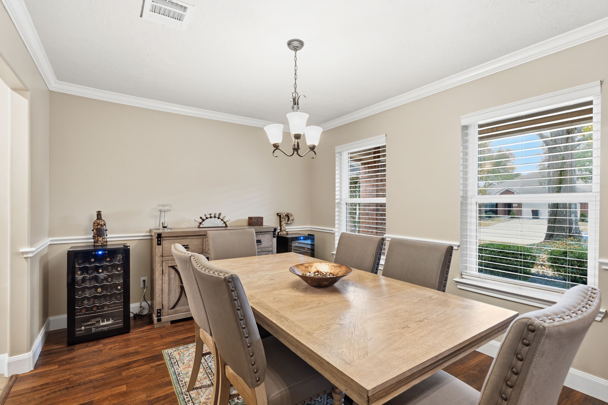 15319 Court Green Trail Cypress, TX 77433 - Photo 10 of 44 a view of a dining room with furniture and wooden floor