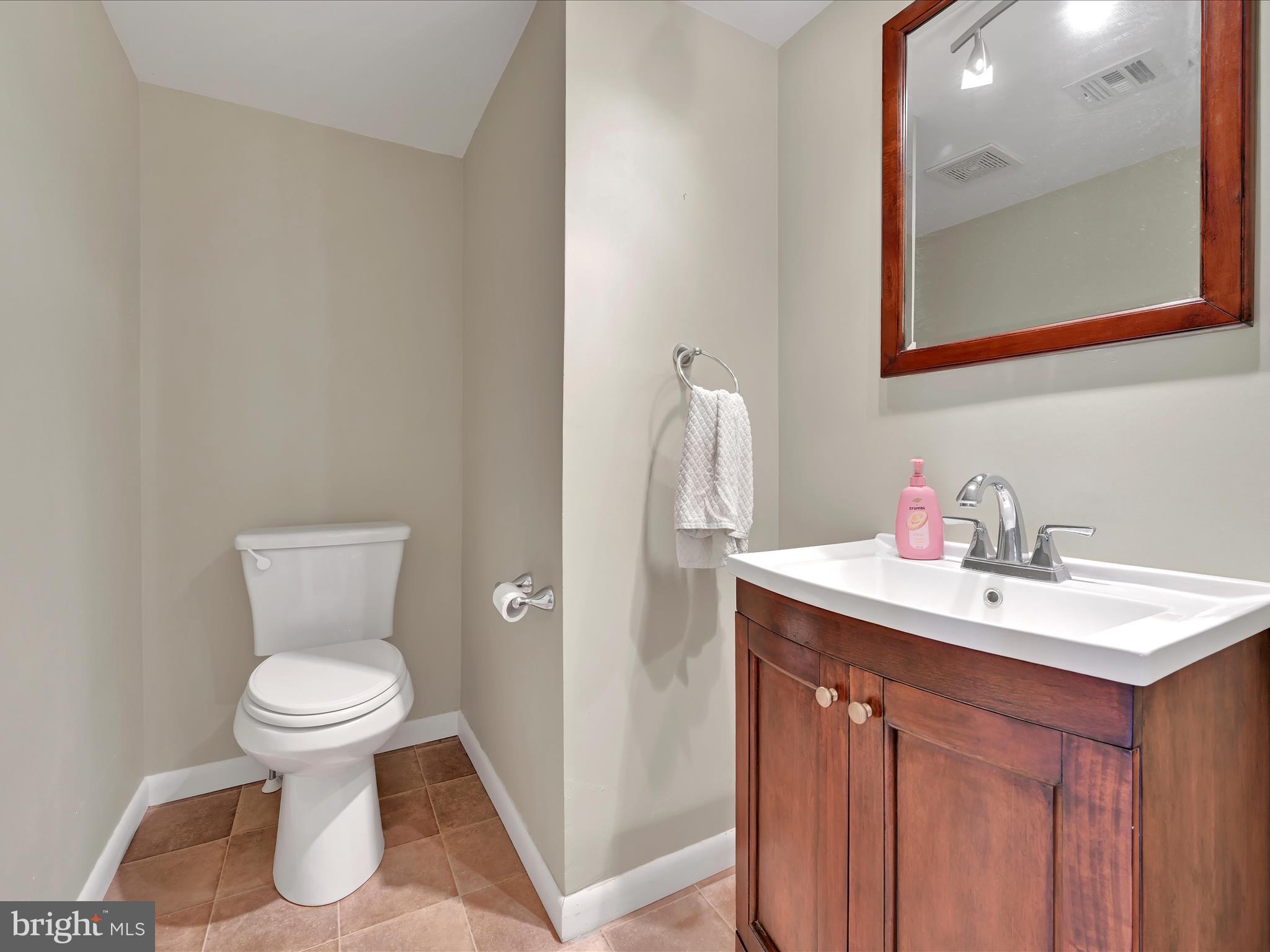 72 Azalea Way Reading, PA 19606 - Photo 15 of 27 a bathroom with a toilet sink and mirror