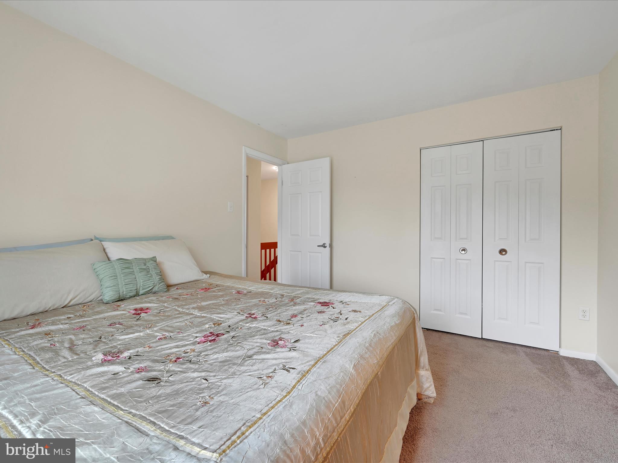 72 Azalea Way Reading, PA 19606 - Photo 24 of 27 a bedroom with a bed and a mirror