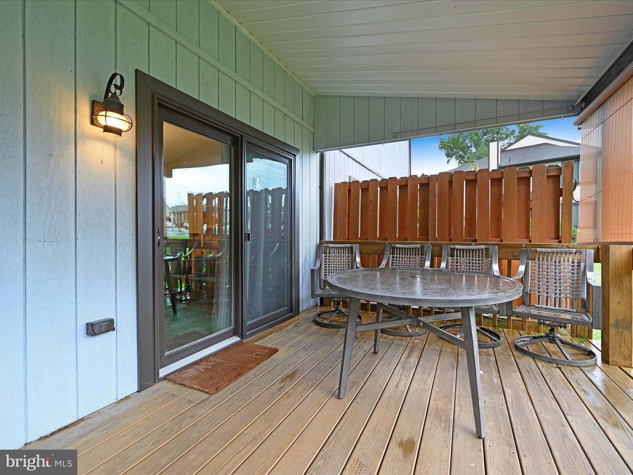 72 Azalea Way Reading, PA 19606 - Photo 25 of 27 a balcony with wooden floor table and chairs
