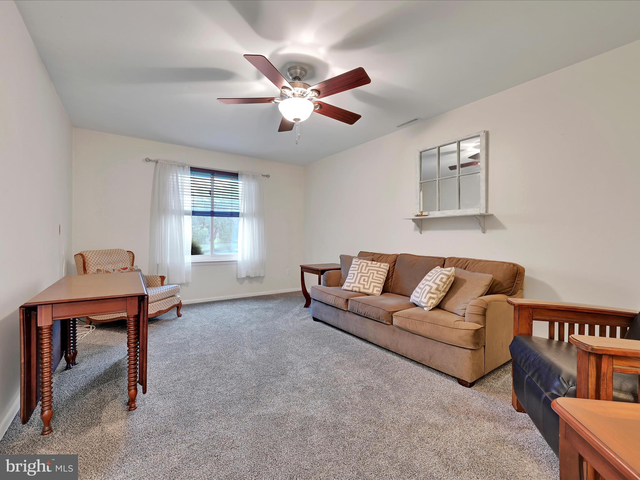 72 Azalea Way Reading, PA 19606 - Photo 5 of 27 a living room with furniture and a window