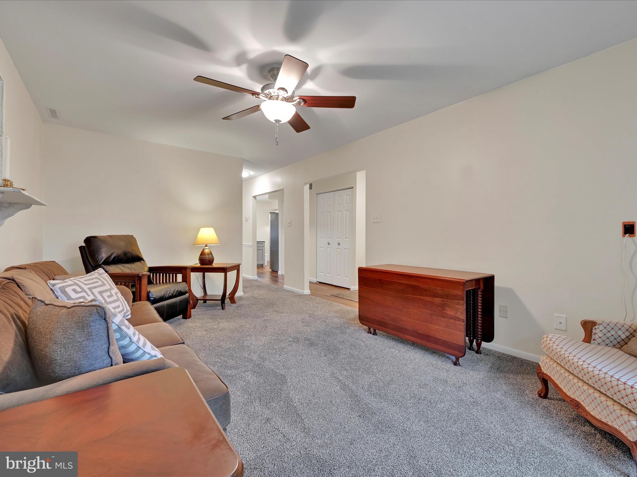 72 Azalea Way Reading, PA 19606 - Photo 6 of 27 a living room with furniture and a chandelier