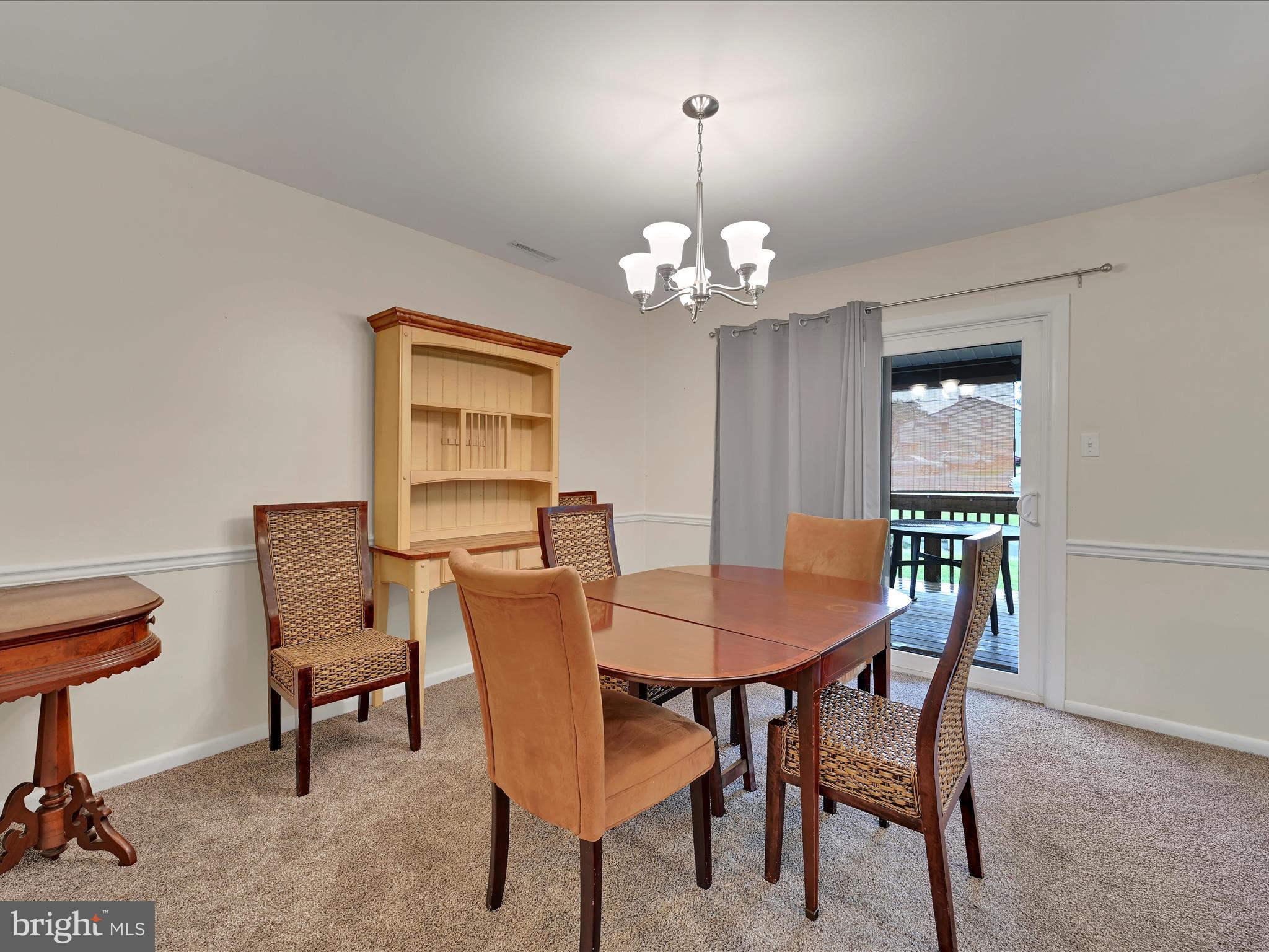 72 Azalea Way Reading, PA 19606 - Photo 7 of 27 a view of a dining room with furniture and chandelier