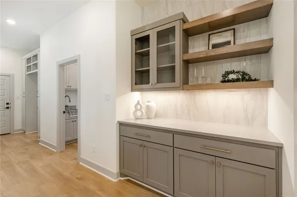 a view of cabinets and window